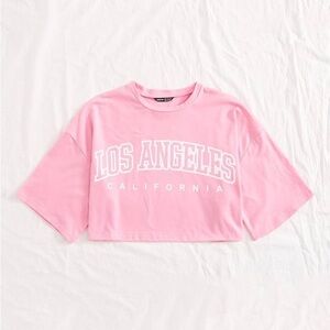 LOS ANGELES pink crop top​​​​​​